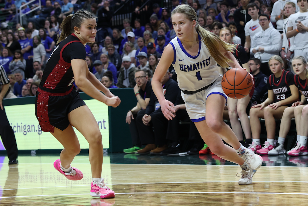 Ishpeming's Jenna Maki (1) drives to the basket during the Division 4 Final.