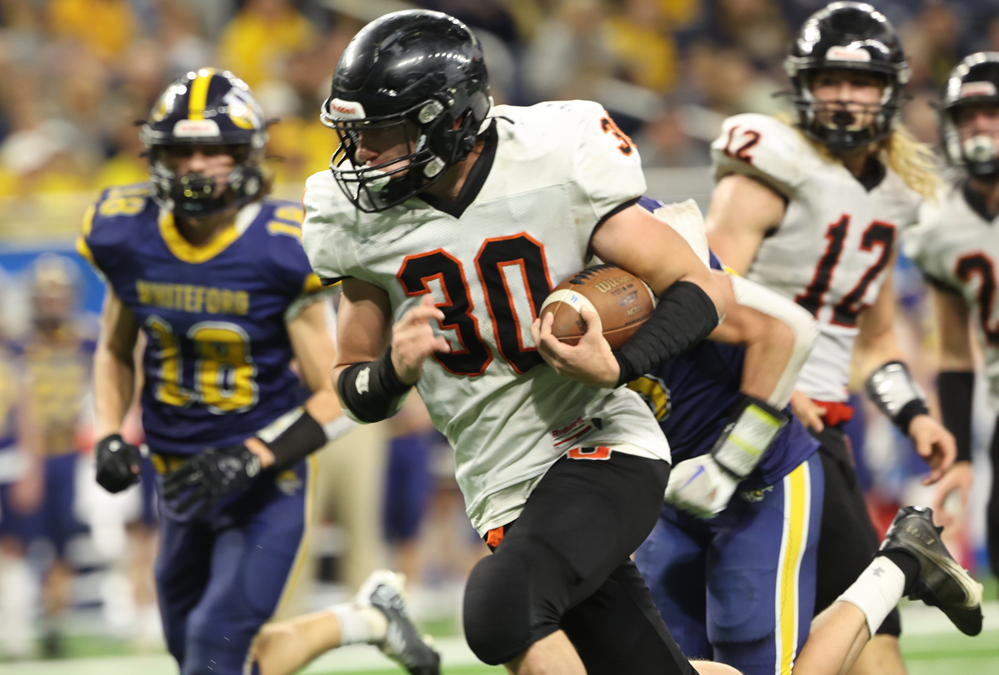 Ubly's Seth Maurer (30) carries the ball during the Division 8 championship win over Ottawa Lake Whiteford in November.