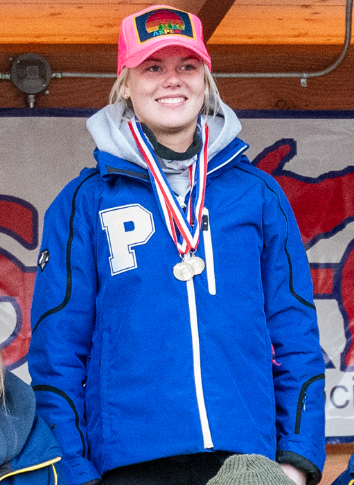 Spencer stands atop the medal stand after sweeping the slalom and giant slalom this season.