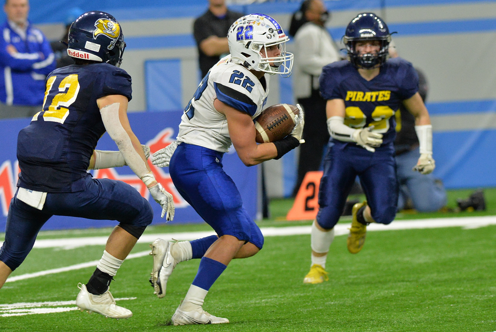 Lawton’s Jake Rueff (22) breaks into the open during his team’s Division 7 Final matchup with Pewamo-Westphalia in 2021.