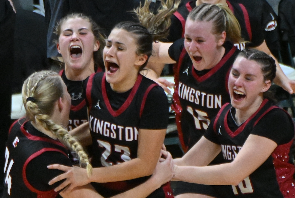 Kingston players celebrate their Division 4 Semifinal win Thursday night at Breslin Center.