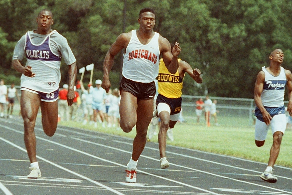 Tyrone Wheatley crosses the finish line first during one of his nine MHSAA Finals championship victories.