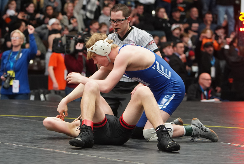 Dundee’s Braeden Davis finishes a pin in his team’s Division 3 Final last Saturday. 