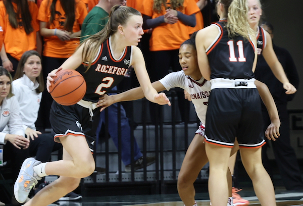 Anna Wypych (2) makes a move toward the basket around a pick from teammate Grace Lyons.