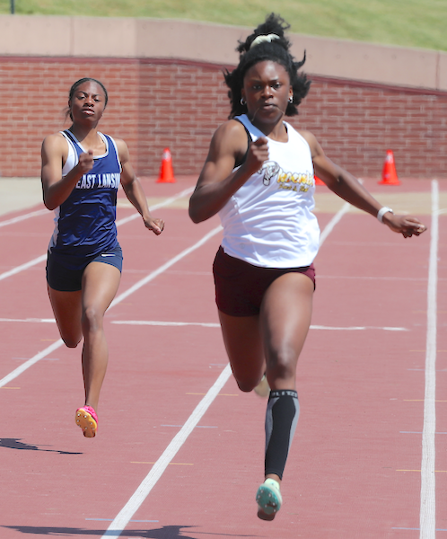 Renaissance's Jayla Dace, right, charges toward the finish. 