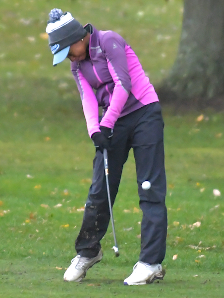 Ann Arbor Greenhills’ Mia Melendez sends an approach on the way to winning her third individual championship.