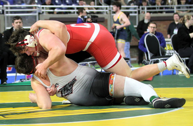 VandenBerg, top position, battles Wyatt Spalo in their Division championship wrestling match at 285 pounds in March at Ford Field. 
